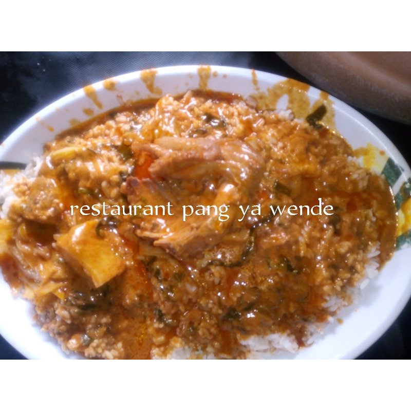Restaurant (riz sauce patte arachides)